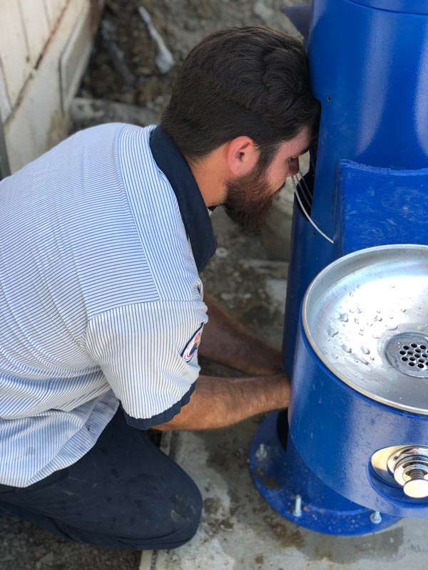 man Repairing water fountains