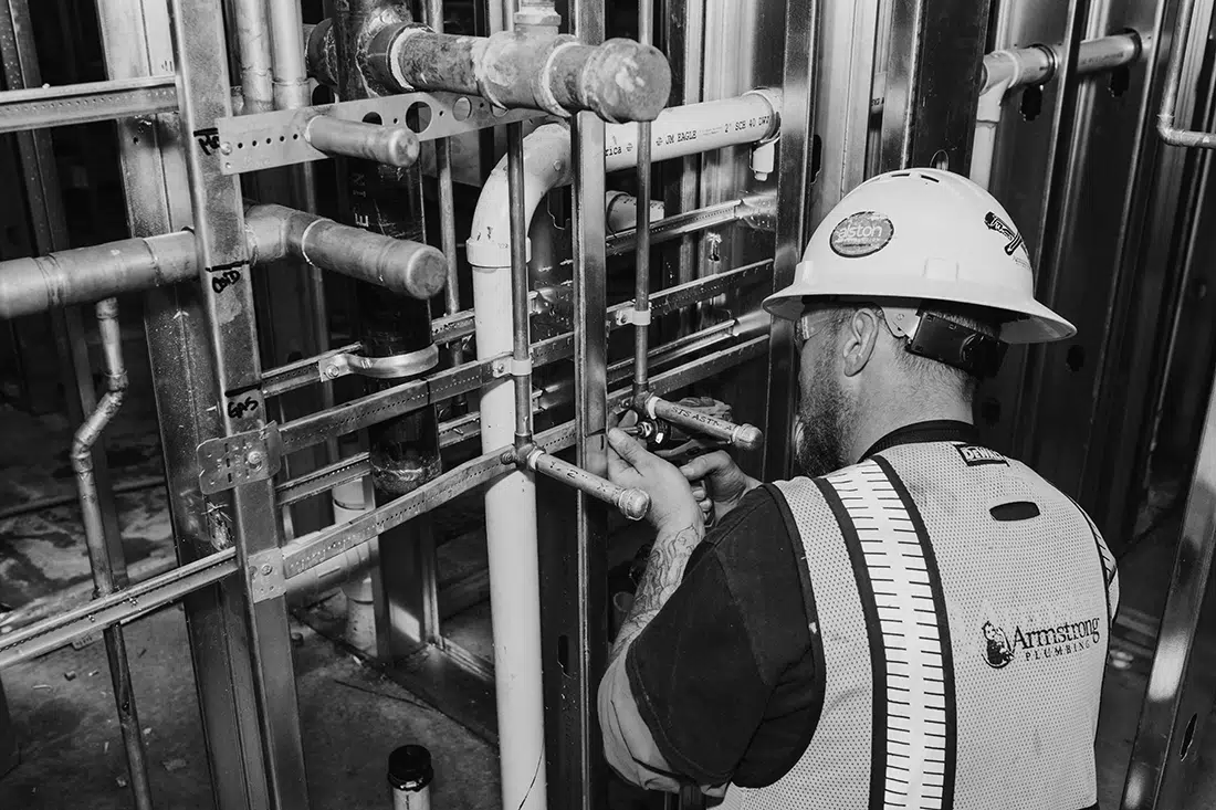 Technician working on Commercial gas line repair in Sacramento, CA.